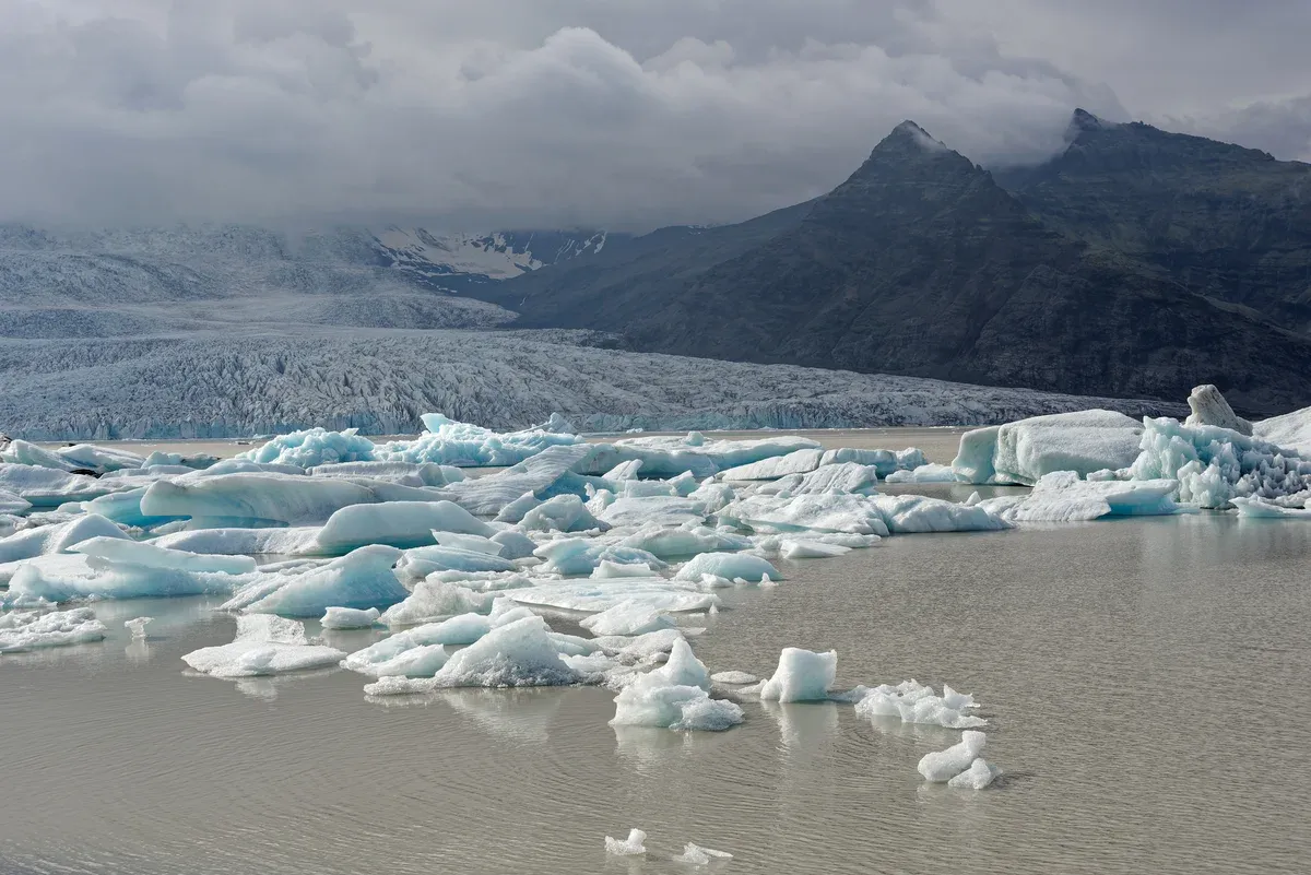 Fjallsárlón glacier lagoon with Fjallsjökull and mountains, a quieter Jökulsárlón boat tour alternative